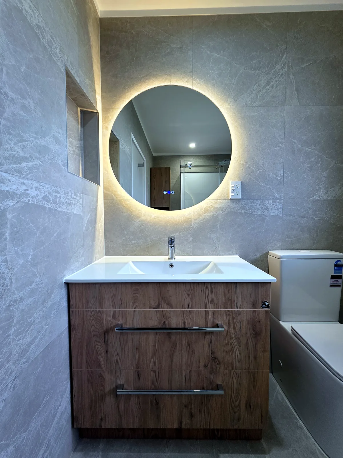 Bathroom renovation in Botany Downs, Auckland — Timber-look vanity, by HouseMakeover